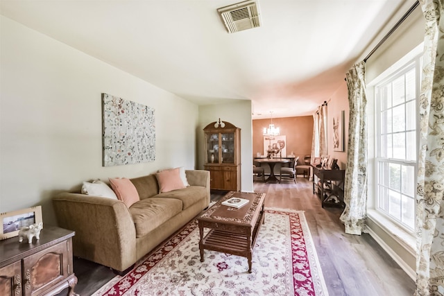 1721 Bowline Rd, Houston, TX 77062 - living area featuring a chandelier and wood finished floors
