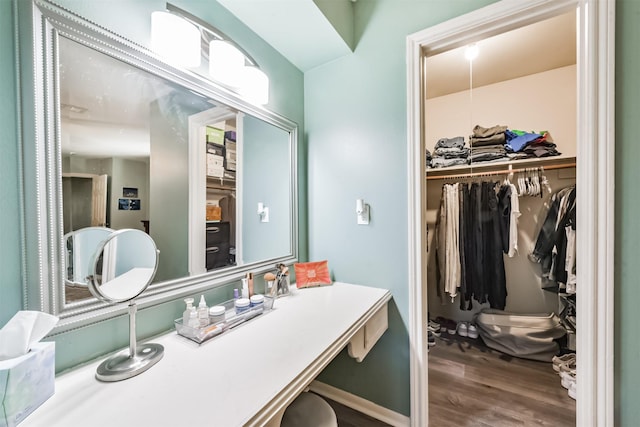 1721 Bowline Rd, Houston, TX 77062 - bathroom featuring wood finished floors, a walk in closet, and vanity