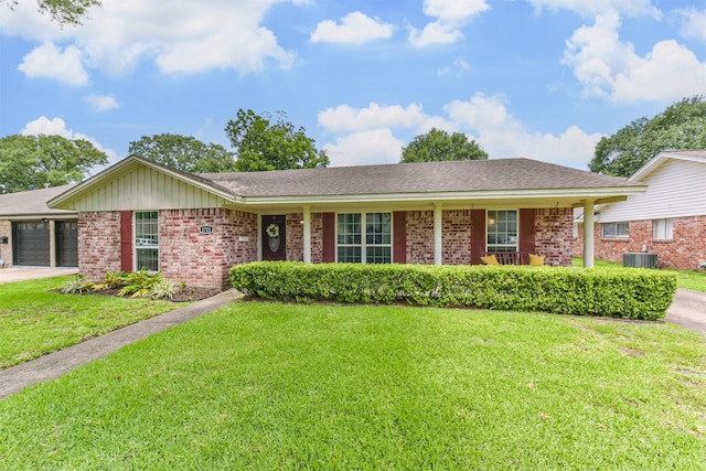 1721 Bowline Rd, Houston, TX 77062 - single story home with brick siding, a front yard, and a garage