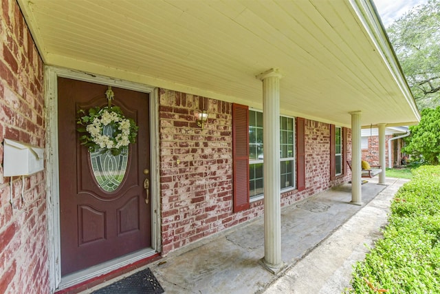 1721 Bowline Rd, Houston, TX 77062 - property entrance featuring covered porch and brick siding