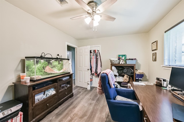 1721 Bowline Rd, Houston, TX 77062 - home office featuring ceiling fan and light wood-style floors