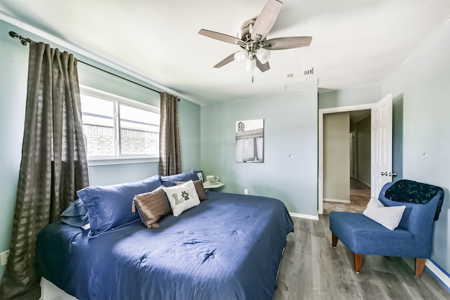 1721 Bowline Rd, Houston, TX 77062 - bedroom featuring wood finished floors and ceiling fan