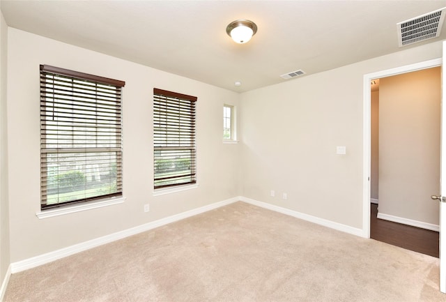 9428 Caddo Ridge Ln, Cypress, TX 77433 - carpeted empty room featuring baseboards