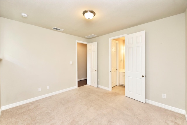 9428 Caddo Ridge Ln, Cypress, TX 77433 - unfurnished bedroom with light carpet and ensuite bathroom