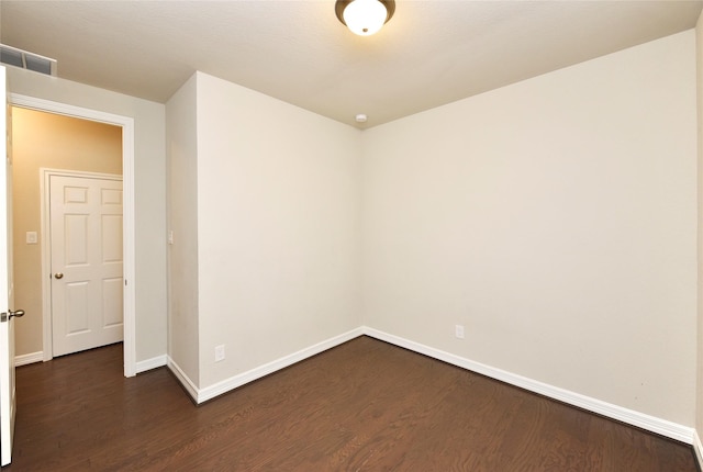 9428 Caddo Ridge Ln, Cypress, TX 77433 - unfurnished room featuring dark wood-style flooring and baseboards