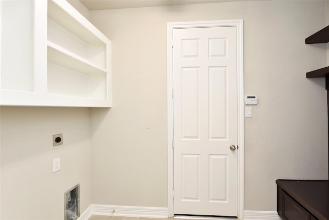 9428 Caddo Ridge Ln, Cypress, TX 77433 - washroom featuring electric dryer hookup and baseboards