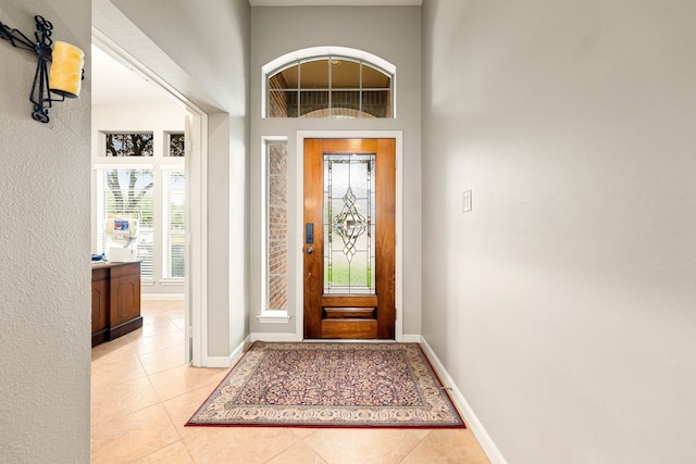 28215 Goose Creek Ct, Fulshear, TX 77441 - entryway with light tile patterned floors and baseboards