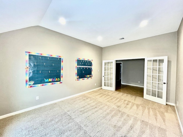 28215 Goose Creek Ct, Fulshear, TX 77441 - carpeted spare room with french doors and vaulted ceiling