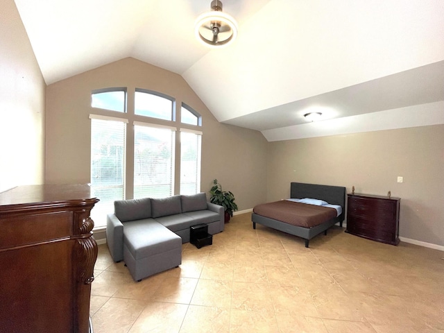 28215 Goose Creek Ct, Fulshear, TX 77441 - bedroom featuring lofted ceiling and light tile patterned floors