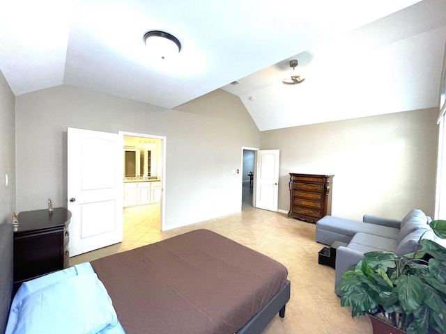 28215 Goose Creek Ct, Fulshear, TX 77441 - bedroom with lofted ceiling, light tile patterned floors, and connected bathroom