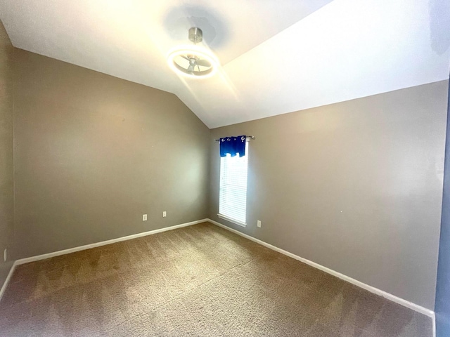 28215 Goose Creek Ct, Fulshear, TX 77441 - empty room featuring carpet flooring and lofted ceiling