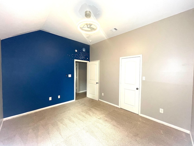 28215 Goose Creek Ct, Fulshear, TX 77441 - unfurnished bedroom featuring carpet and lofted ceiling