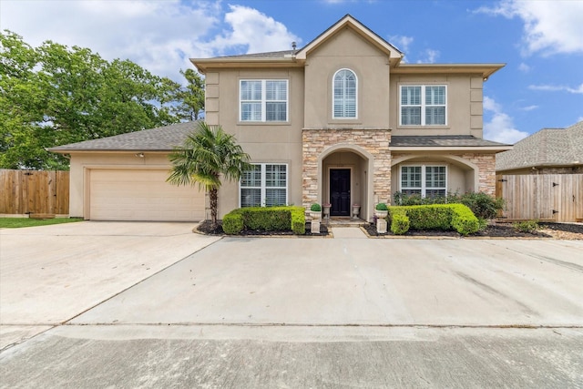 1440 Waseca St, Houston, TX 77055 - traditional-style house featuring stucco siding, stone siding, concrete driveway, and a garage