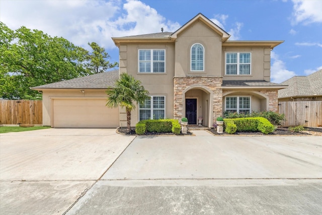 1440 Waseca St, Houston, TX 77055 - traditional-style home featuring stucco siding, stone siding, concrete driveway, a garage, and a shingled roof