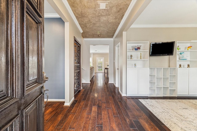 1440 Waseca St, Houston, TX 77055 - entrance foyer with dark wood-type flooring and crown molding