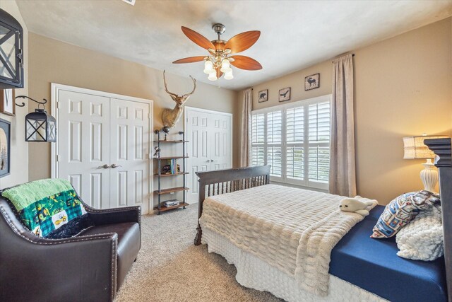 1440 Waseca St, Houston, TX 77055 - bedroom with carpet flooring, multiple closets, and a ceiling fan