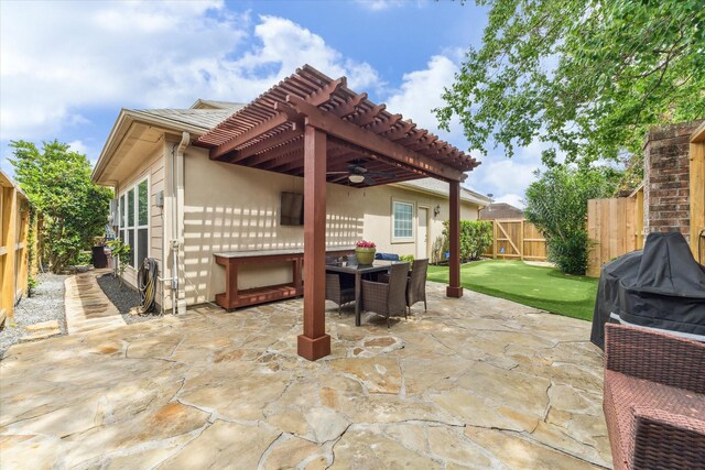 1440 Waseca St, Houston, TX 77055 - fenced backyard with a pergola, a patio, a ceiling fan, outdoor dining space, and area for grilling