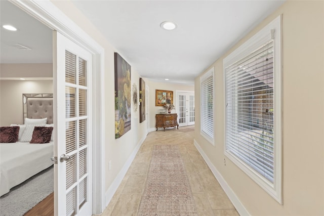 8220 Wateka Cir, Houston, TX 77074 - hallway with french doors, recessed lighting, and light tile patterned floors