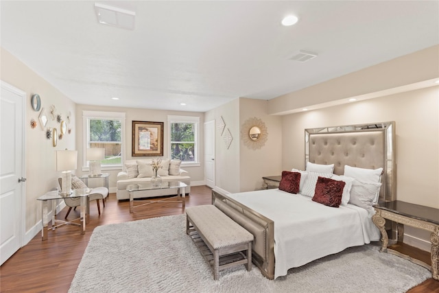 8220 Wateka Cir, Houston, TX 77074 - bedroom with wood finished floors and recessed lighting