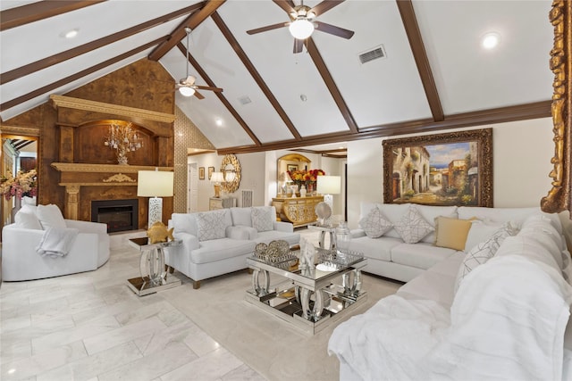 8220 Wateka Cir, Houston, TX 77074 - living room with a ceiling fan, beamed ceiling, a fireplace, and high vaulted ceiling