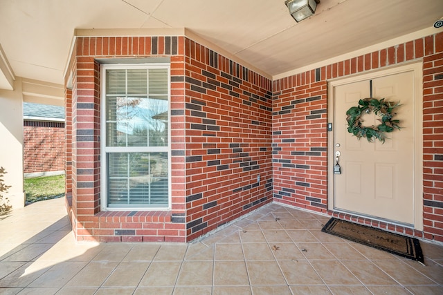 9710 Golden Park Ln, Houston, TX 77088 - property entrance featuring brick siding and covered porch