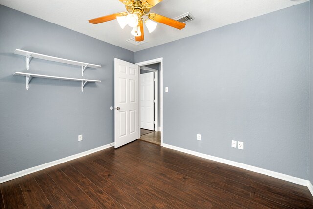 9710 Golden Park Ln, Houston, TX 77088 - unfurnished bedroom featuring wood finished floors and a ceiling fan