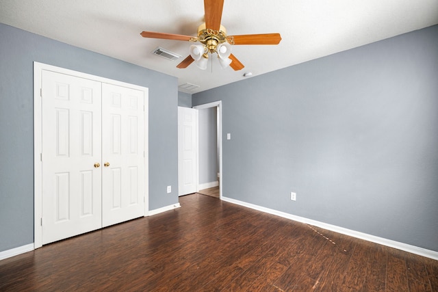 9710 Golden Park Ln, Houston, TX 77088 - unfurnished bedroom featuring wood finished floors, a closet, and ceiling fan