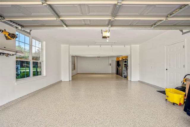 16206 Lakewood Field Dr, Tomball, TX 77377 - garage featuring a garage door opener