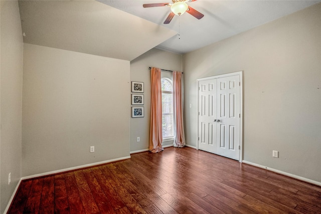 16206 Lakewood Field Dr, Tomball, TX 77377 - unfurnished bedroom with lofted ceiling, wood finished floors, and a ceiling fan