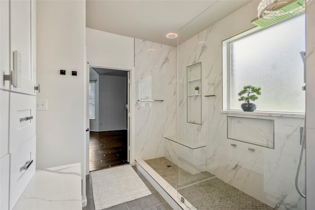 16206 Lakewood Field Dr, Tomball, TX 77377 - full bathroom with a marble finish shower