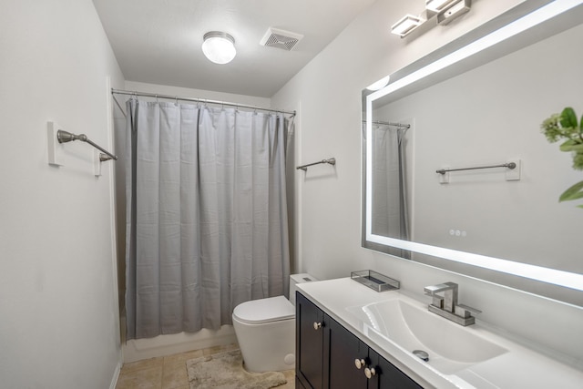 16206 Lakewood Field Dr, Tomball, TX 77377 - bathroom featuring vanity, tile patterned floors, and shower / bath combo with shower curtain