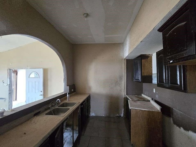 1524 Wolsey Dr, Clint, TX 79836 - kitchen featuring light countertops and arched walkways