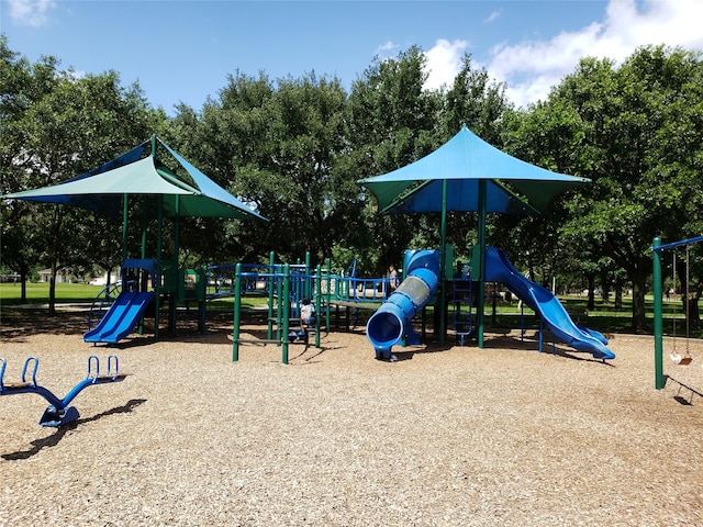 5110 Contour Pl, Houston, TX 77096 - community jungle gym featuring view of wooded area