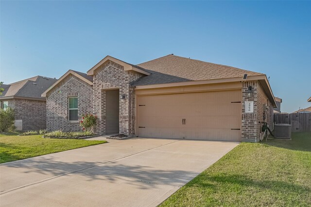 29626 Weber Way Ct, Katy, TX 77494 - view of front facade with brick siding, an attached garage, a front yard, and concrete driveway