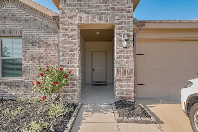 29626 Weber Way Ct, Katy, TX 77494 - property entrance featuring a garage and brick siding