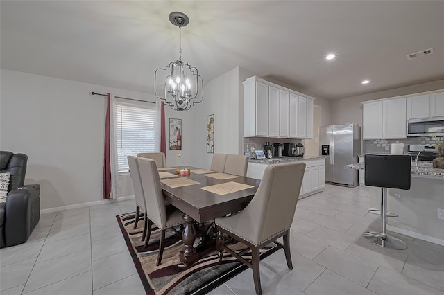 29626 Weber Way Ct, Katy, TX 77494 - dining area with a chandelier, light tile patterned flooring, and recessed lighting
