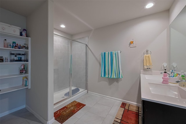 29626 Weber Way Ct, Katy, TX 77494 - bathroom with double vanity, a stall shower, tile patterned flooring, and recessed lighting