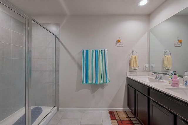 29626 Weber Way Ct, Katy, TX 77494 - full bathroom with double vanity, a shower stall, and tile patterned flooring
