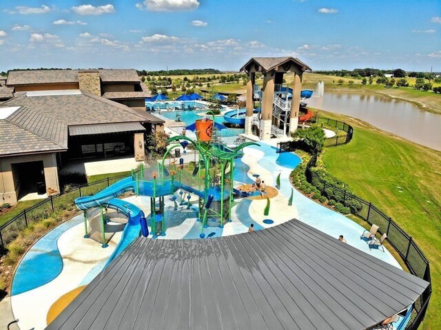 30106 Reagans Ranch Dr, Katy, TX 77494 - bird's eye view of a pool and a large body of water