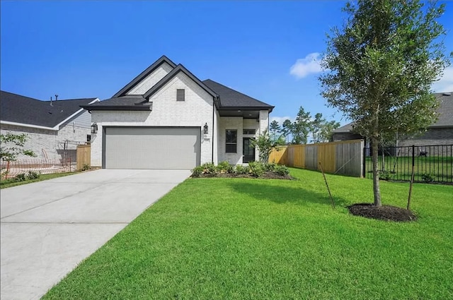 120 Lukewood Cir, Conroe, TX 77318 - view of front of home featuring brick siding, driveway, and an attached garage