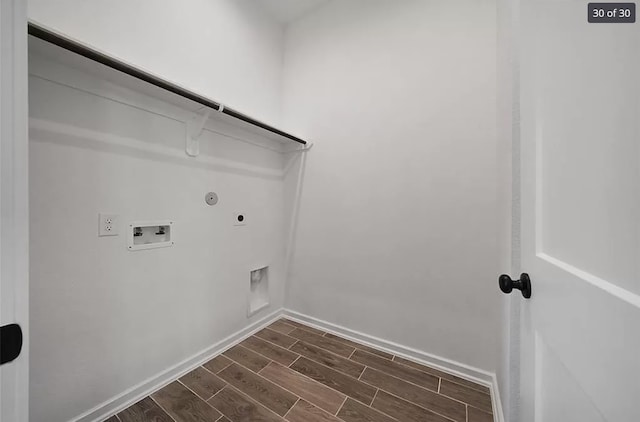 120 Lukewood Cir, Conroe, TX 77318 - laundry area with hookup for a gas dryer, washer hookup, wood finish floors, and electric dryer hookup