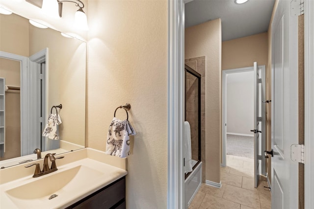 28647 Maple Red Dr, Katy, TX 77494 - bathroom with vanity, tile patterned flooring, and enclosed tub / shower combo