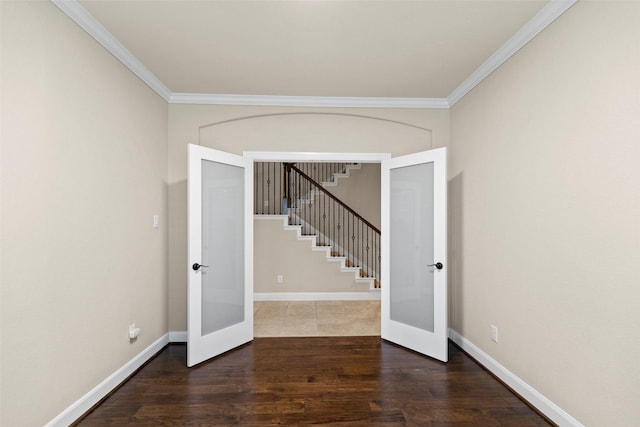 28647 Maple Red Dr, Katy, TX 77494 - unfurnished room with french doors, crown molding, wood finished floors, and stairway