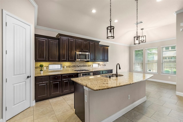28647 Maple Red Dr, Katy, TX 77494 - kitchen featuring appliances with stainless steel finishes, vaulted ceiling, tasteful backsplash, light tile patterned floors, and light stone counters