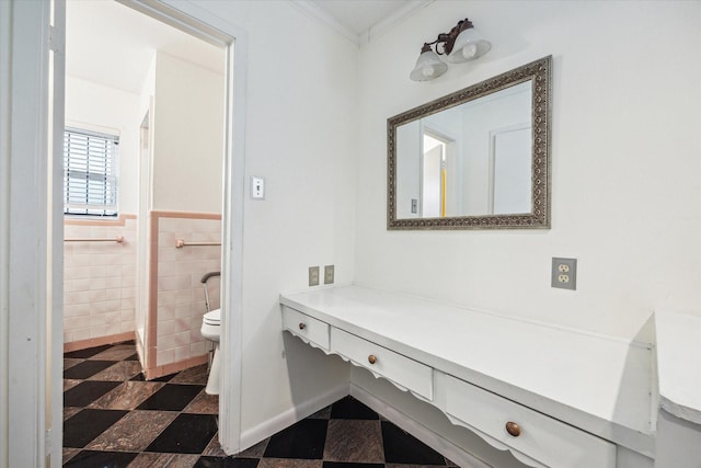 2415 W T C Jester Blvd, Houston, TX 77008 - bathroom with tile walls, vanity, a wainscoted wall, and crown molding