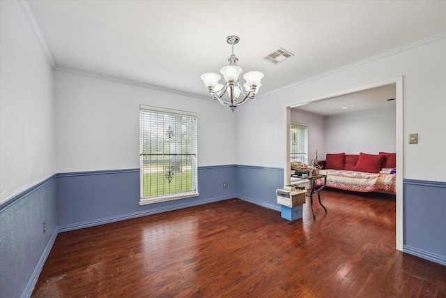 2415 W T C Jester Blvd, Houston, TX 77008 - spare room with a chandelier, ornamental molding, healthy amount of natural light, and wood finished floors