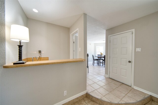 21434 Park Bluff Dr, Katy, TX 77450 - kitchen featuring tile patterned flooring and baseboards
