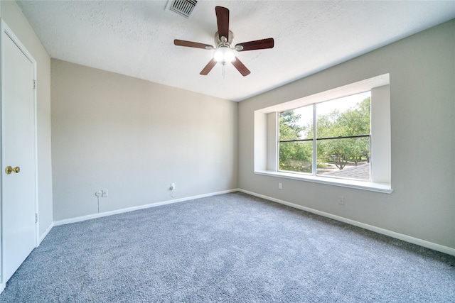 21434 Park Bluff Dr, Katy, TX 77450 - carpeted spare room with a ceiling fan and a textured ceiling