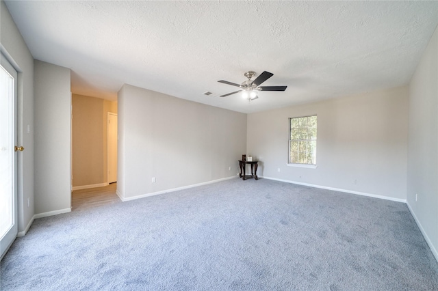 21434 Park Bluff Dr, Katy, TX 77450 - carpeted empty room featuring a textured ceiling and a ceiling fan