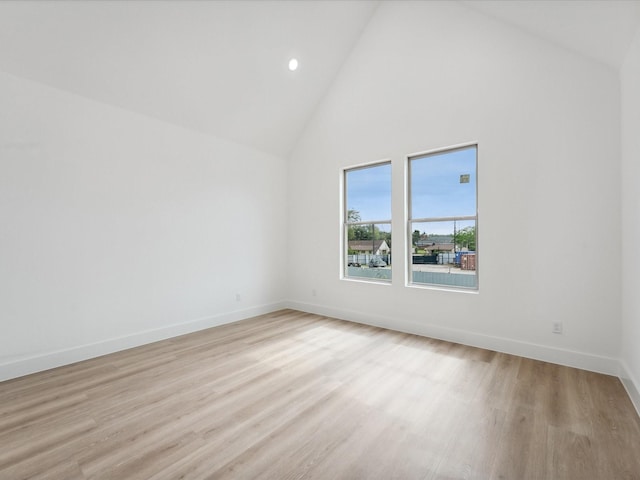 7420 Maxroy St, Houston, TX 77088 - bonus room featuring high vaulted ceiling, light wood-style flooring, and recessed lighting